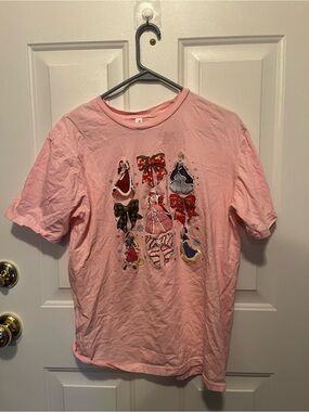 Pink Women' Graphic T-Shirt with Bow and Dress Motif